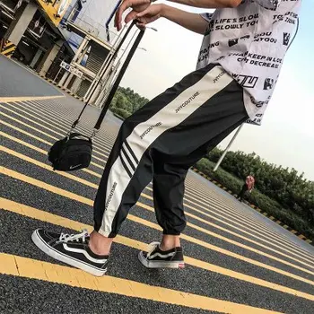 A Moda Harajuku Lado Listrado Hip Pop Corredores De Mens Longa Colcha De Retalhos Reflexiva Carga Calça Elástica De Alta Cintura De Calças De Moletom
